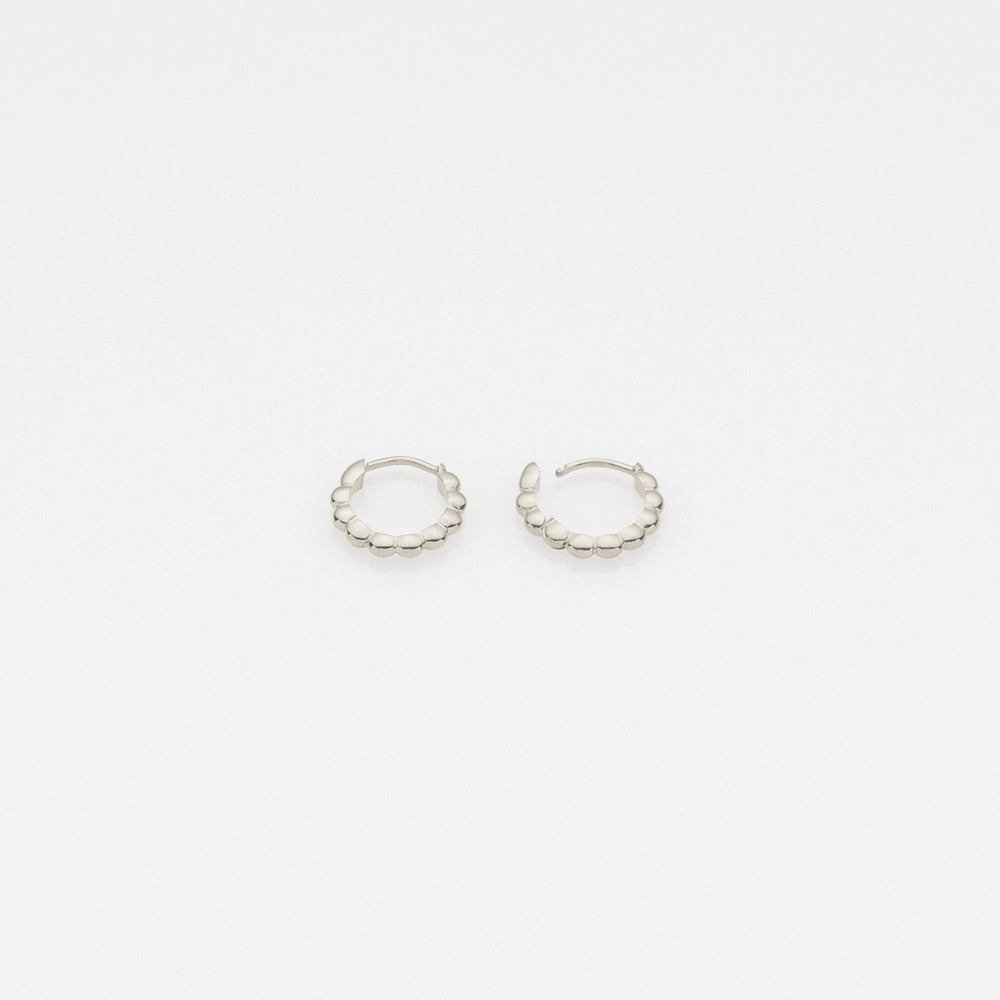 Tiny Treasures puff huggies earrings 14K white gold