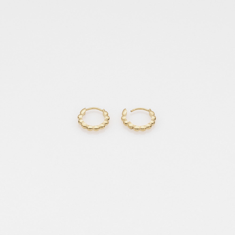 Tiny Treasures puff huggies earrings 14K yellow gold