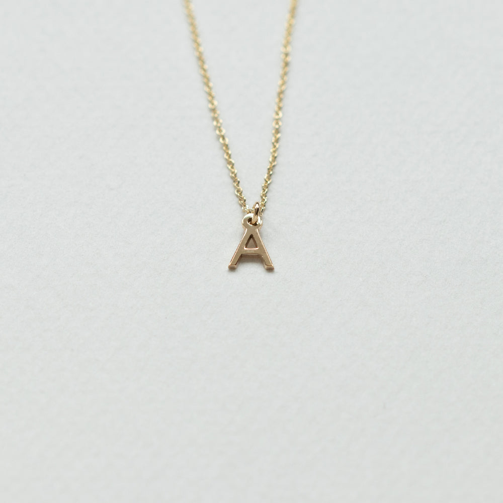 Initial necklace 14Κ yellow gold