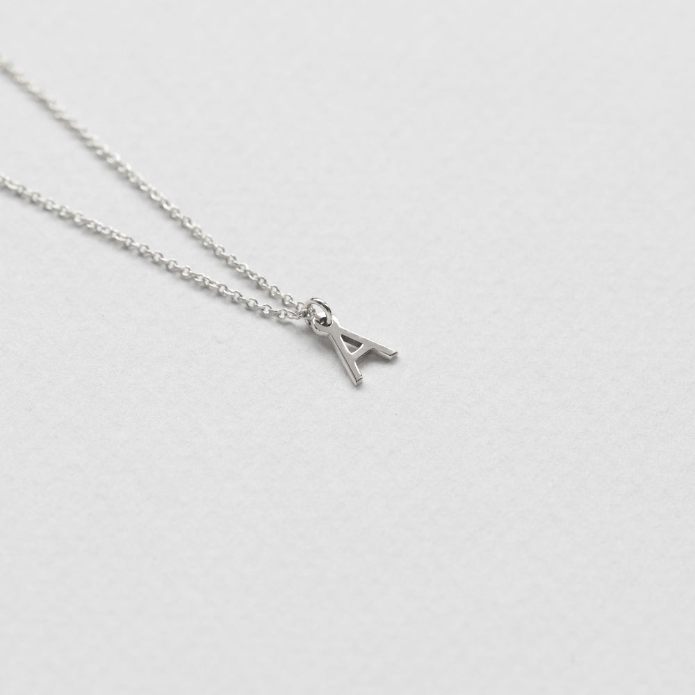 Initial necklace 14K white gold