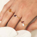 Fizzy rope sky topaz & rhodolite tourmaline ring 14K yellow gold
