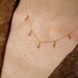 L'eau charm necklace gold