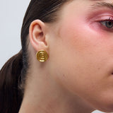 Spinning earrings gold