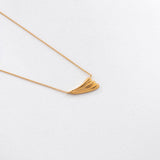 Surfing necklace gold